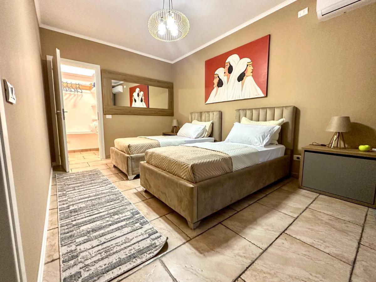 Amos City Center Apartment Tirana Buitenkant foto
